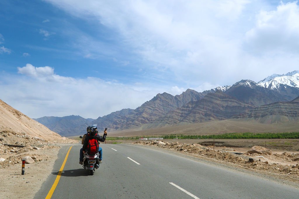 India – June 17 2017: tourist riding motorbike on the road Leh Ladakh – India